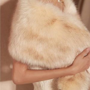 Faux Fur Shawl. Never worn but has no tag. Looks and feels like real fur.